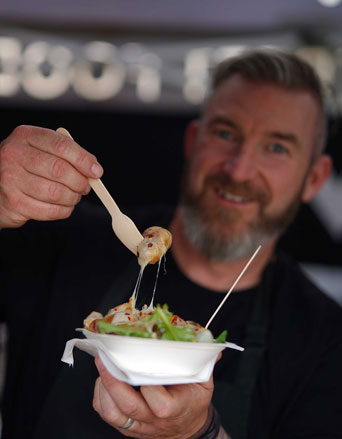 exhibitor-demonstrating-dish